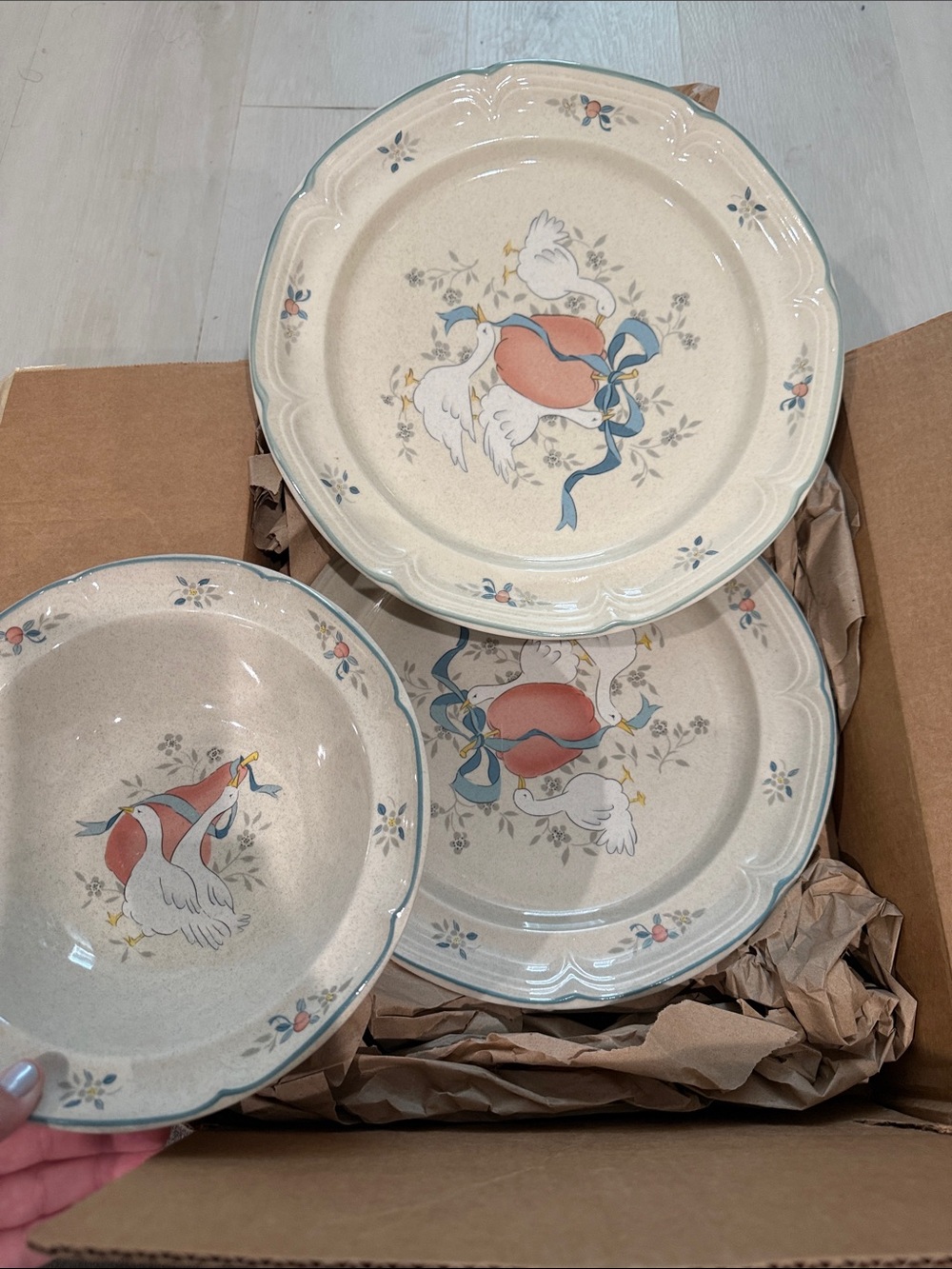 Sango Cream Dinnerware Set with Peach Motif and Blue Ribbon Accents